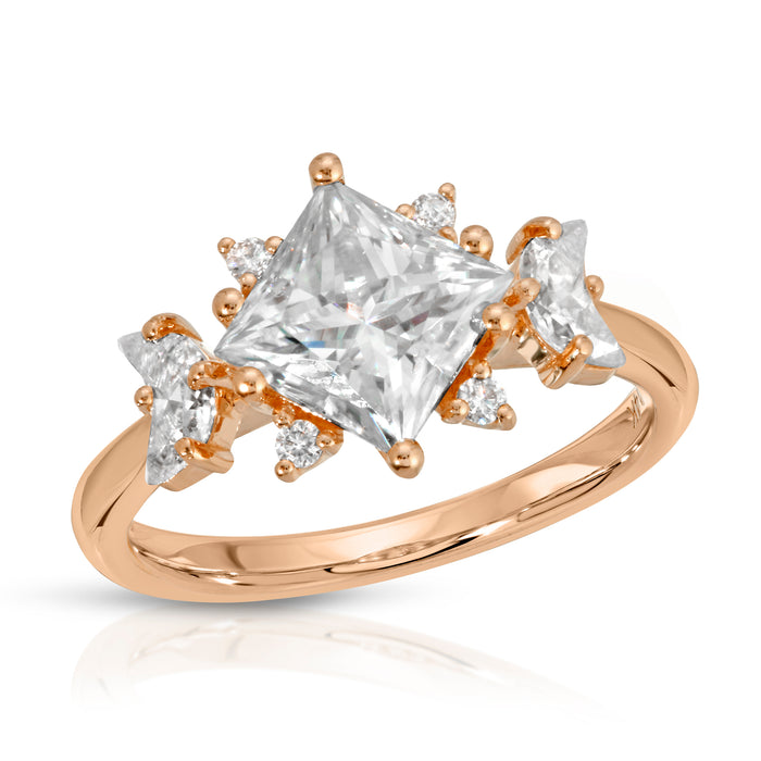 rose gold princess cut moissanite ring with crescent cut moissanite side stone